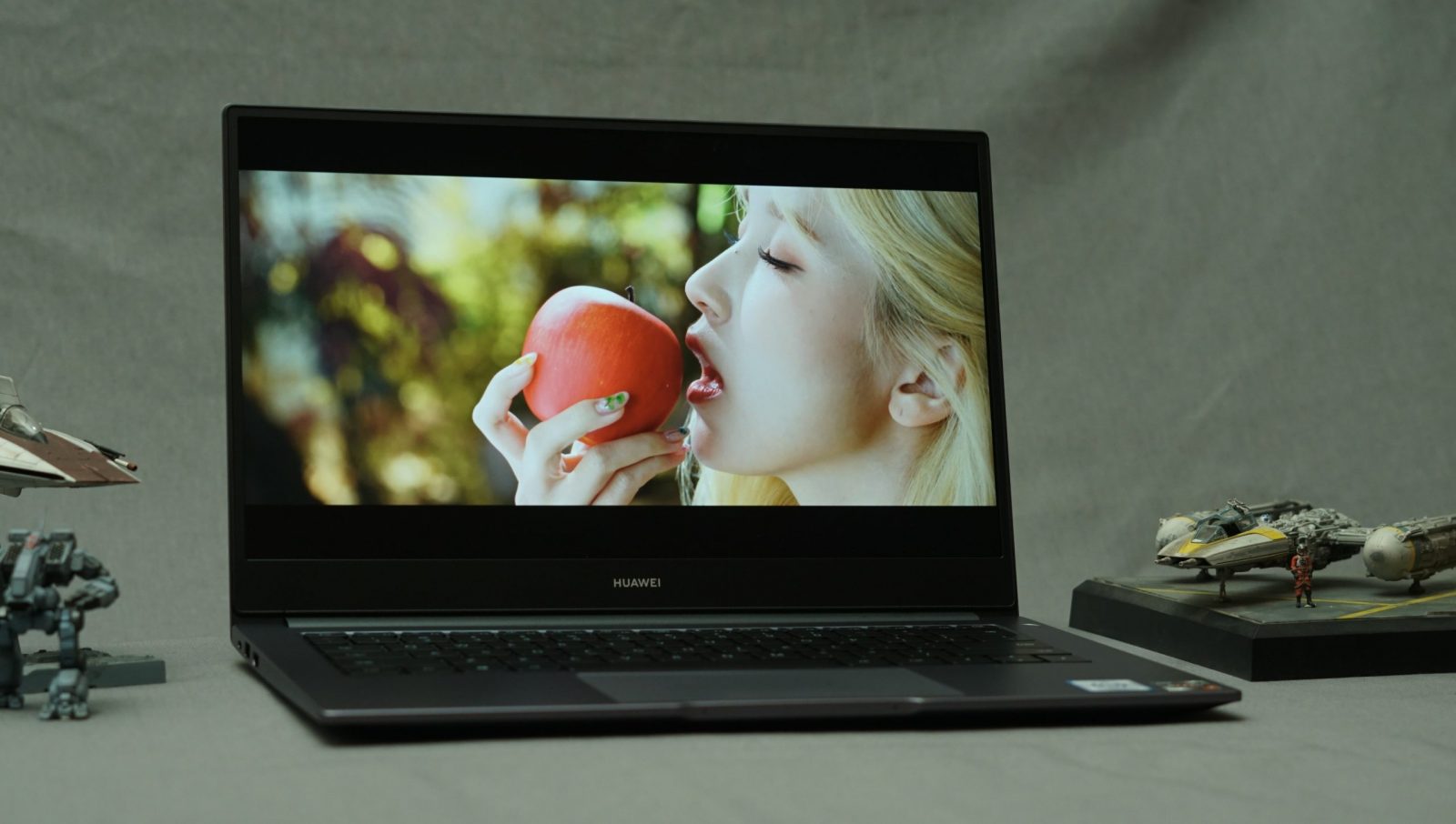 Kpop music video being played on the Huawei Matebook D14