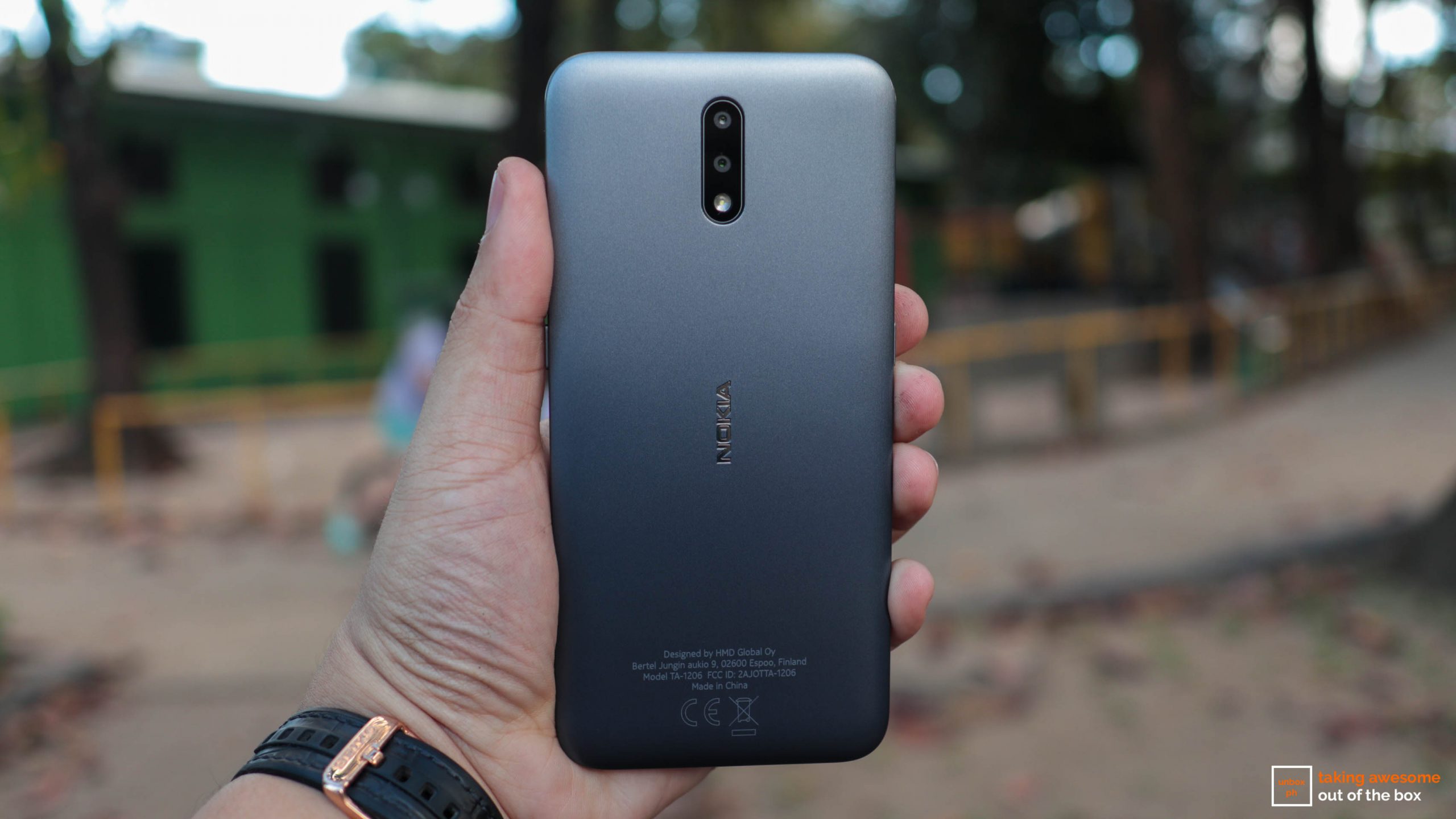 photo of the Nokia 2.3 back cover being held