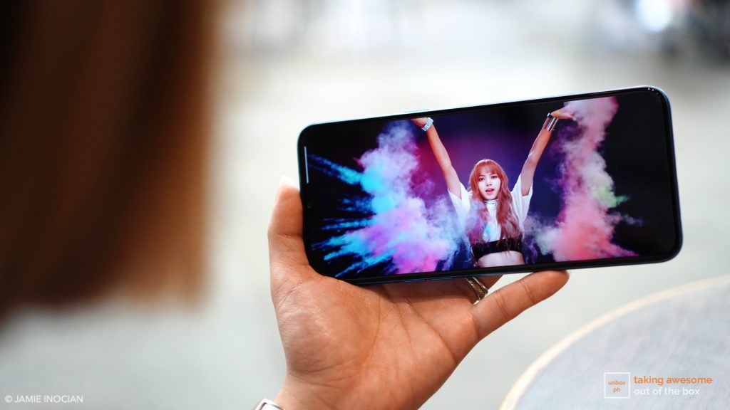 Realme C3 playing a music video