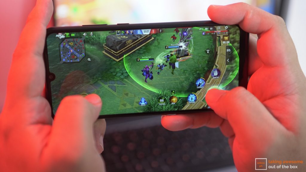 person playing moba game on huawei y6p