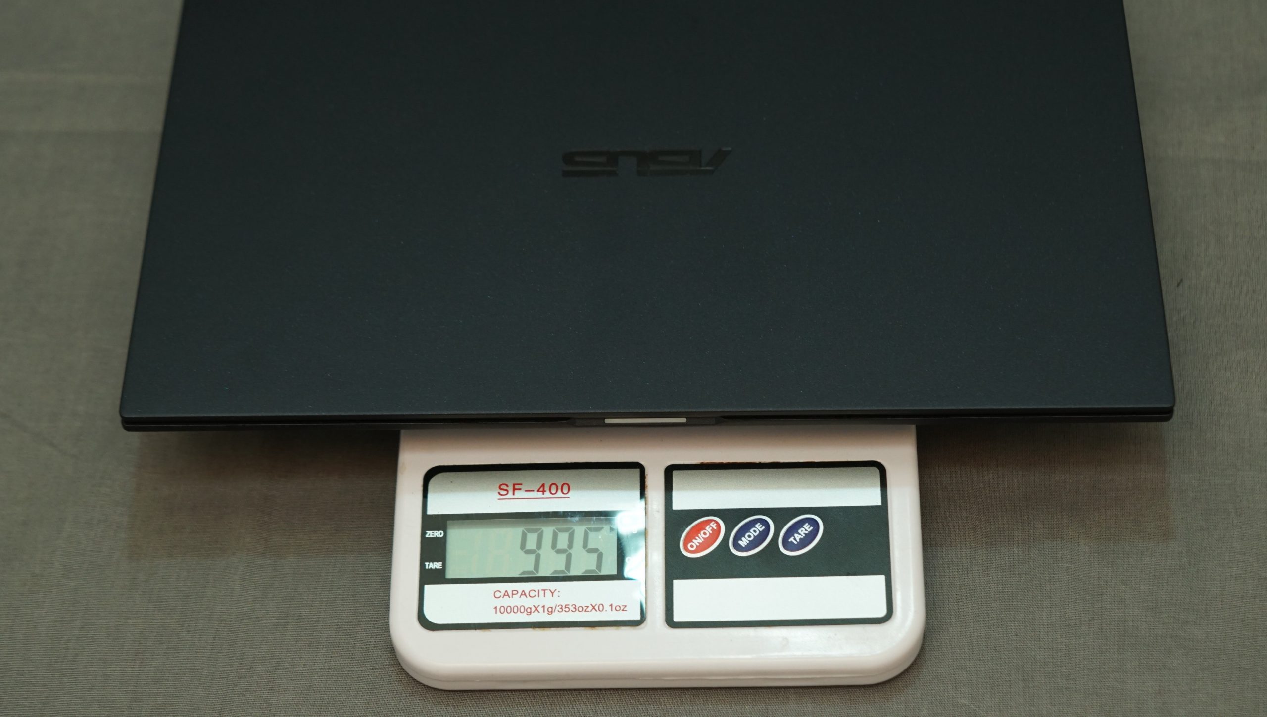 ASUS ExpertBook B9 being weighed