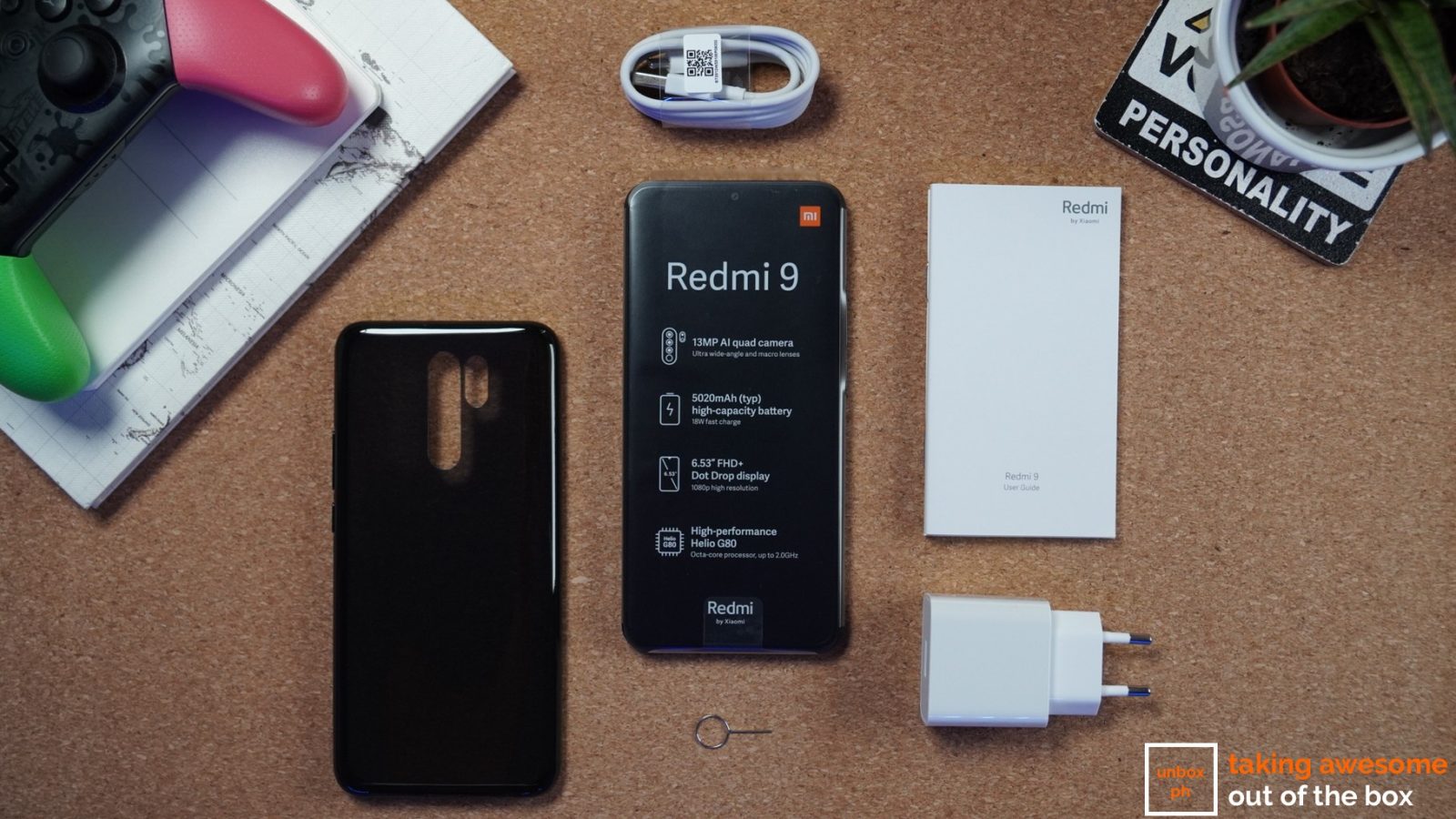 Contents of Redmi 9's packaging